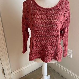 American Eagle small woman’s rust colored scalloped edged sweater.